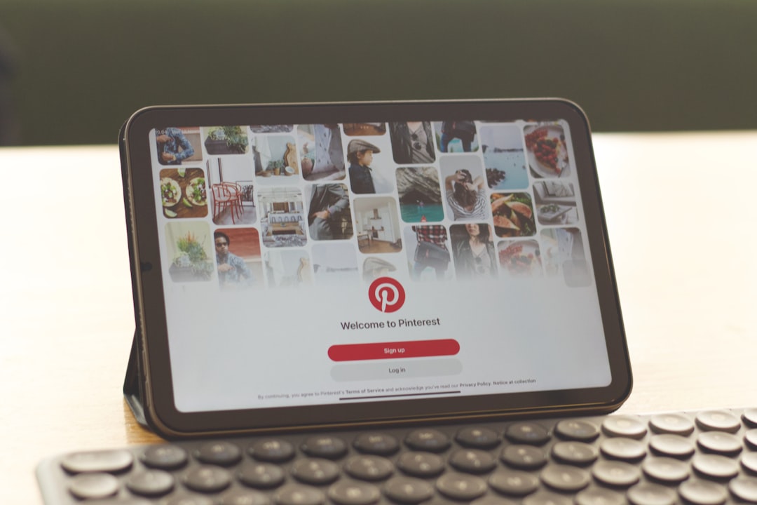 a-tablet-sitting-on-top-of-a-keyboard-ahbzm5ykbia